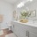 bathroom with a large mirror