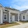 a few townhomes with windows and front doors