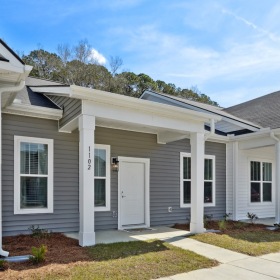 Welcome home a few townhomes with windows and front doors